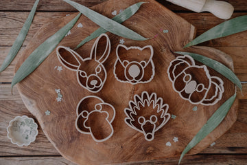 Top view of Aussie animal face eco cutter set featuring Koala, Kangaroo, Wombat, Echidna, and Platypus made from natural bioplastic.