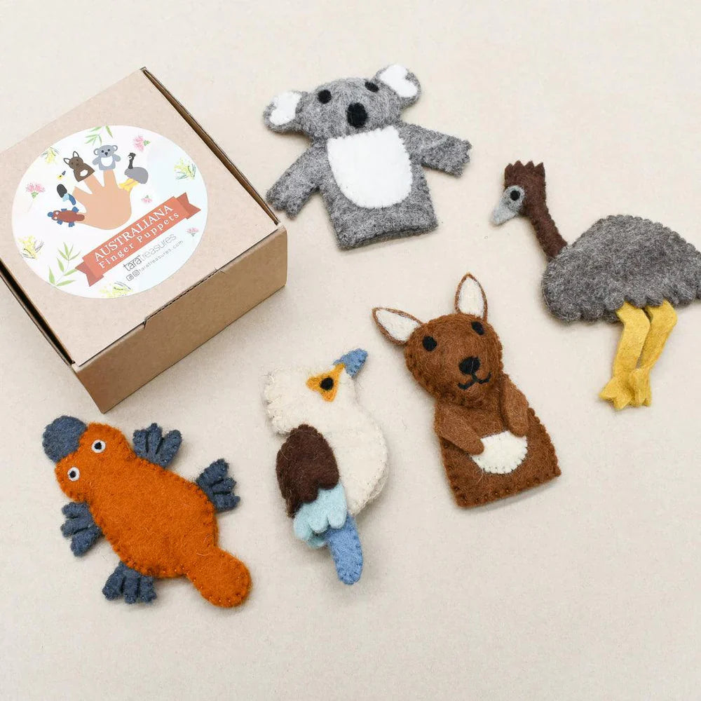 Felt Australian animal finger puppets arranged beside decorative cardboard box, including native creatures like emu and koala.