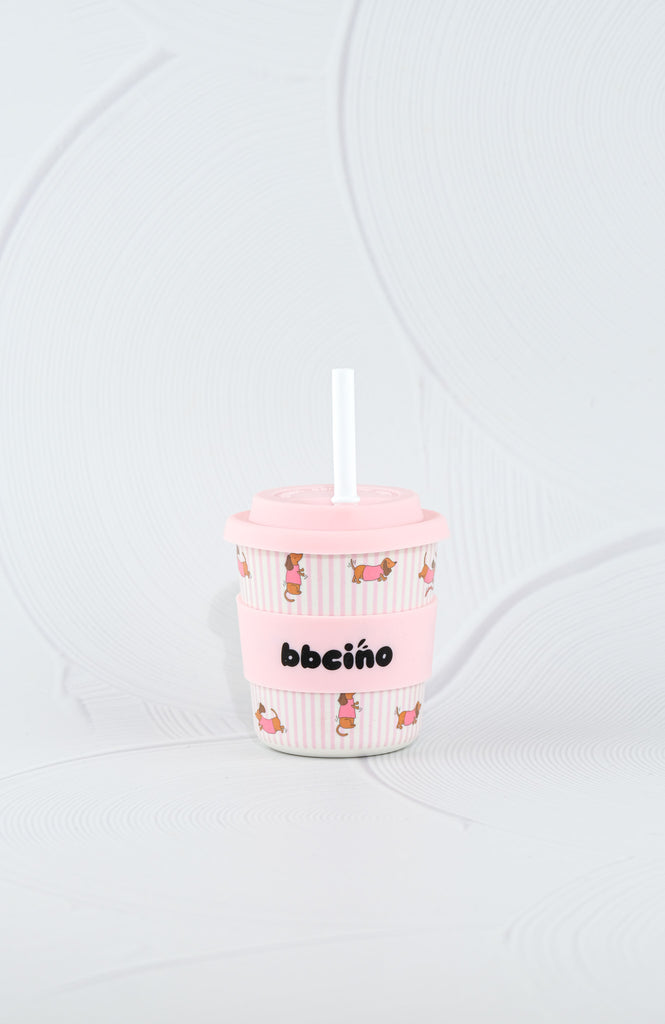 BBCino Bambinocino reusable cup 240ml in Dash in Pink dachshund dog design with pastel pink silicone lid and white straw, eco-friendly bamboo fibre keep cup.