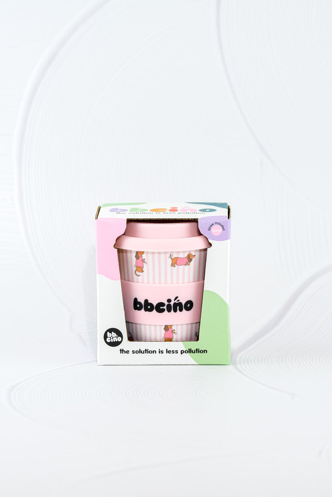 BBCino Dash in Pink reusable Bambinocino cup 240ml with dachshund dog print and pastel pink lid, sustainable bamboo fibre babycino cup in eco packaging.