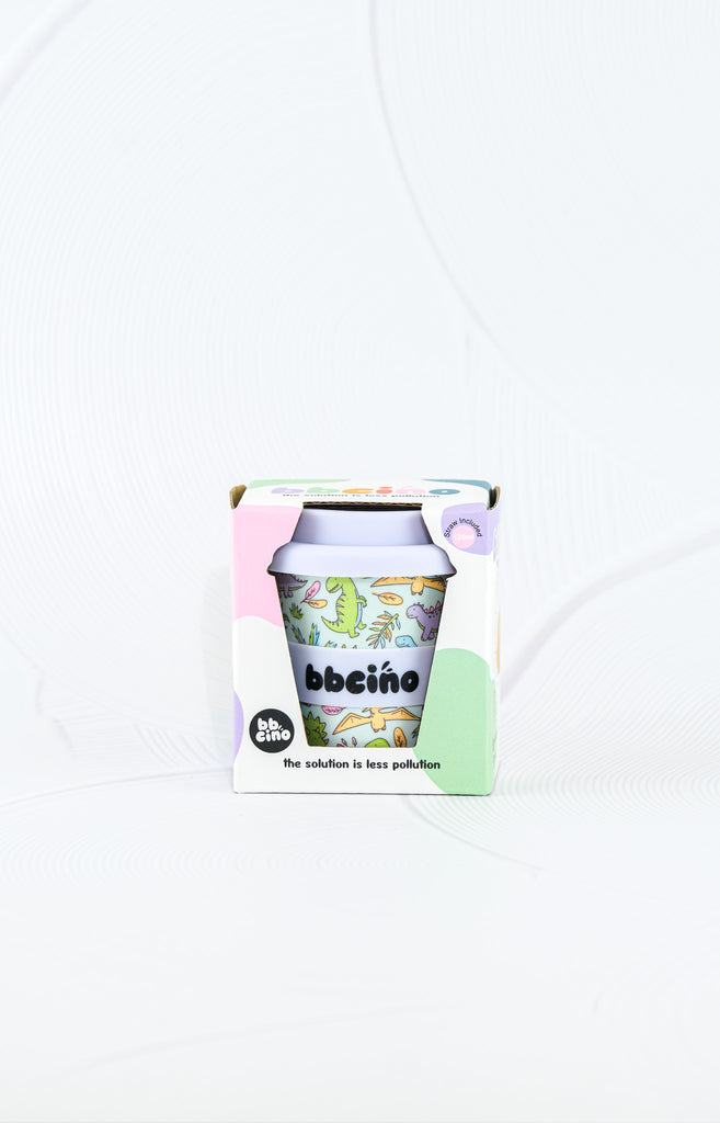 BBCino Sipasaurus reusable cup 120ml in dinosaur design, packaged in eco-friendly box with white silicone lid, sustainable babycino cup.
