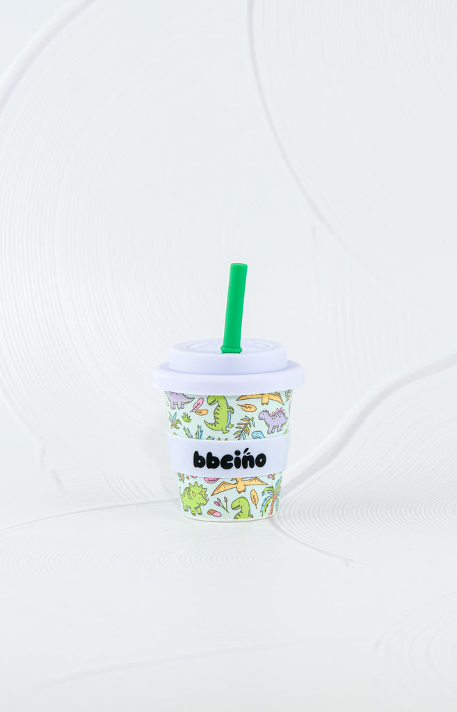 BBCino reusable bamboo cup 120ml in Sipasaurus dinosaur print with white silicone lid and green straw, eco-friendly kids keep cup.