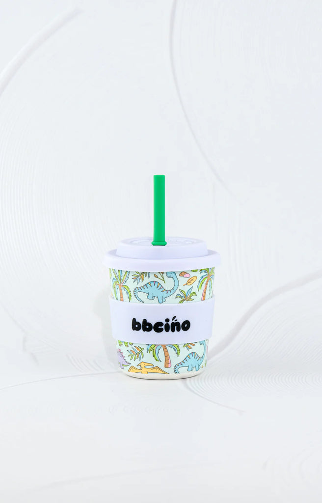 BBCino reusable cup 240ml in Sipasaurus dinosaur print with white silicone lid and green straw, eco-friendly bamboo fibre keep cup.