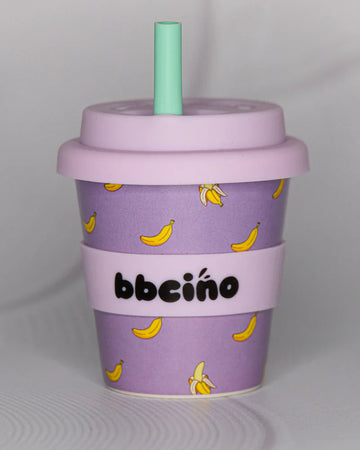 BBCino 120ml reusable cup in purple with a Banana design, made from sustainable bamboo. Lightweight, durable, and perfect for babycinos, espressos, or small drinks.