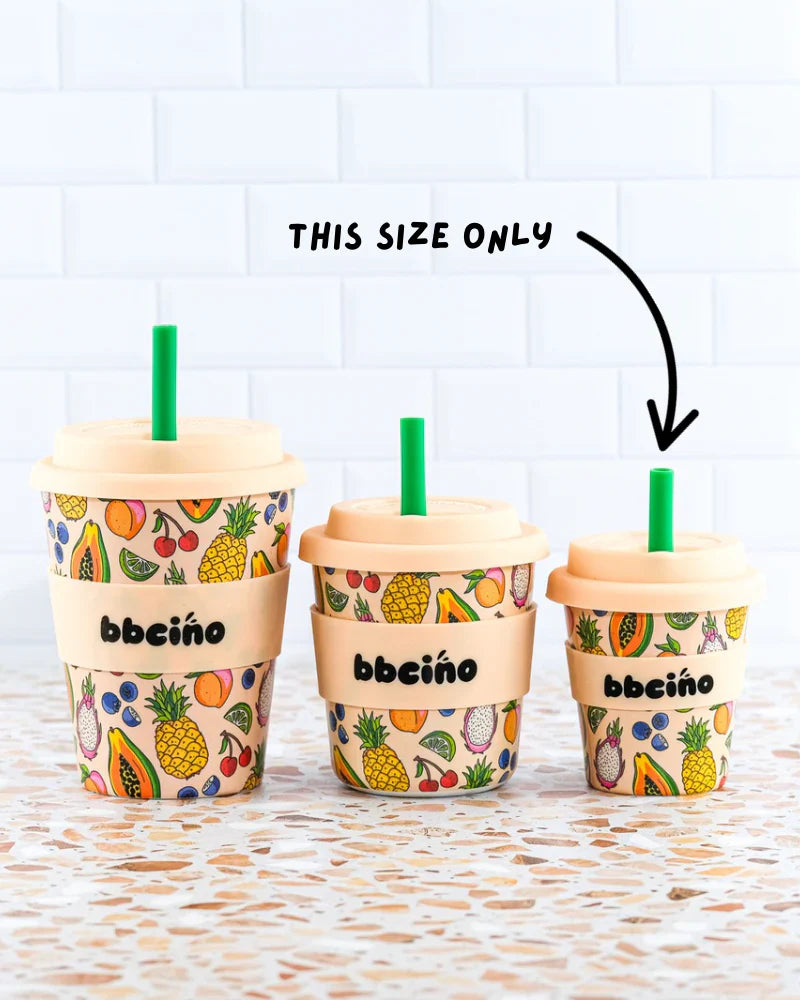 Set of reusable 120ml bamboo kids’ cups with tropical fruit design, perfect for babycinos, milkshakes or juice.