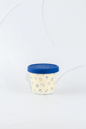 BBCino bamboo reusable snack pot with navy lid and Brunch-Kins breakfast print, lightweight eco-friendly food container for kids’ snacks.