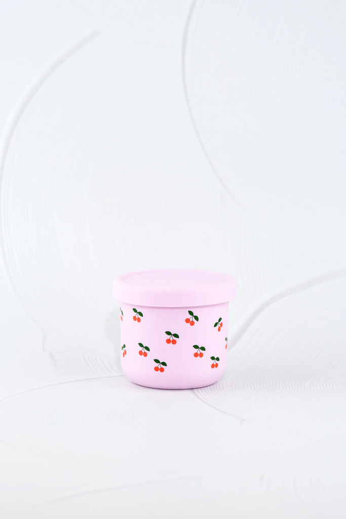 BBCino silicone snack pot 250ml in Cherub design with pastel pink base and cherry print, lightweight eco-friendly reusable container with silicone lid.