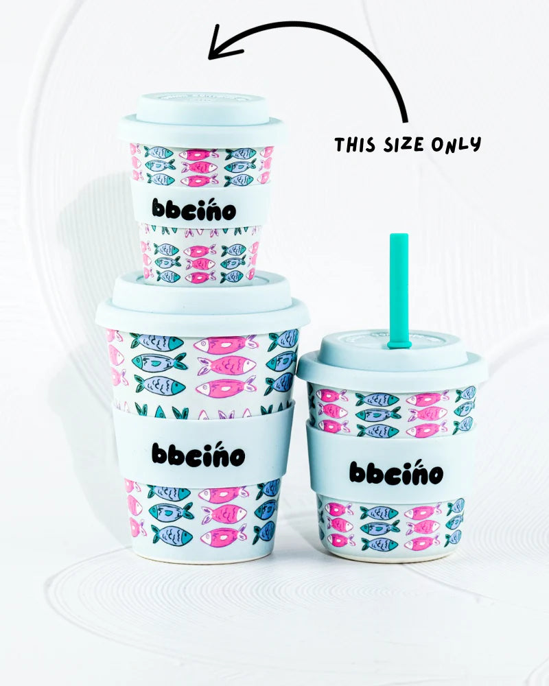 Stack of BBCino x Ashleigh Fish cups with arrow indicating 120ml size, styled against white tiles