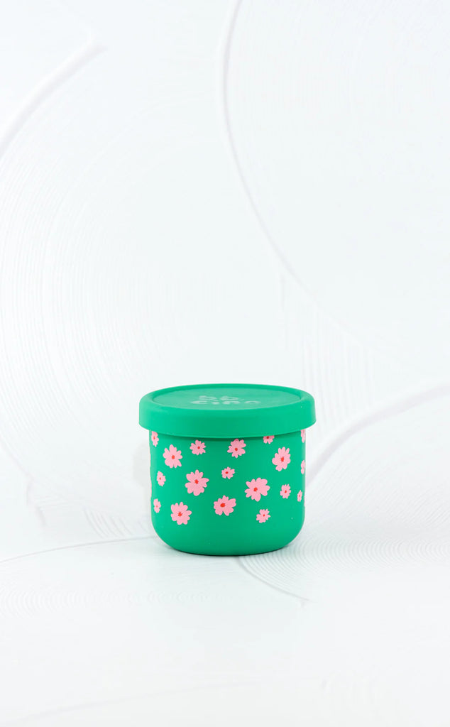 BBCino silicone snack pot 250ml in Ditsy design with green base and pink flower print, dishwasher safe and reusable food container for kids’ snacks.