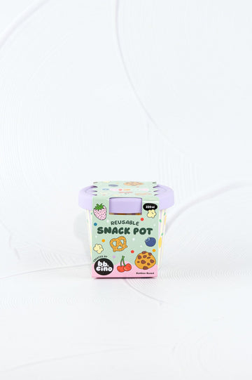 BBCino eco-friendly bamboo snack pot with yellow lemon print and pastel purple silicone lid in retail packaging.