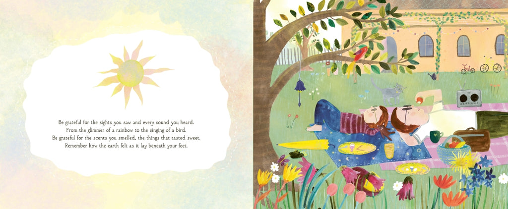 Illustration of a couple lying on a blanket under a tree with a sun and building in the background.