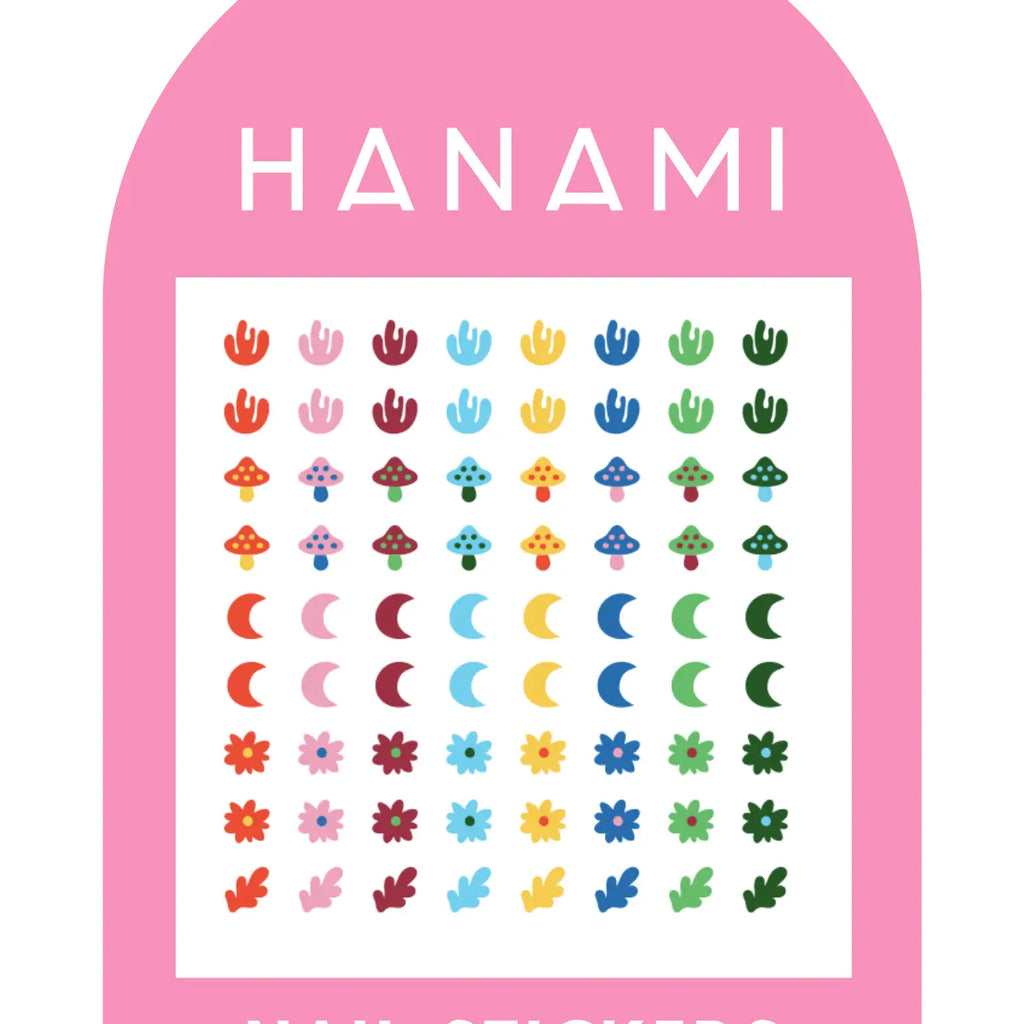 A sheet of colorful Hanami nail stickers displayed on pink packaging, featuring tiny mushrooms, moons, flowers, leaves, and abstract shapes in various colors.