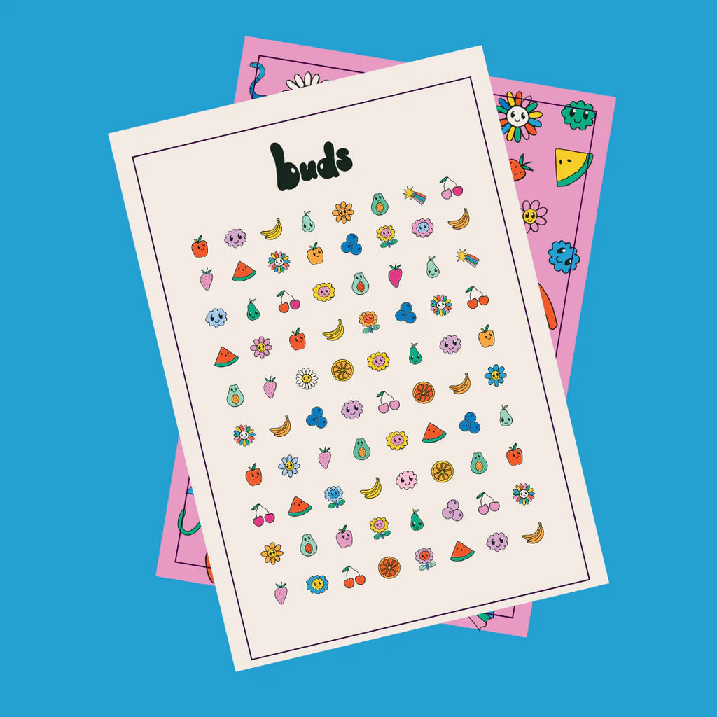 Two sheets of Buds fruit-themed nail stickers with playful illustrations of cherries, bananas, pears, and flowers on a bright blue background.