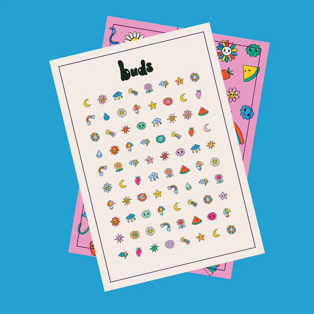 Two sheets of Buds Nail Stickers Weather Edition displayed on a bright blue background, showing cute designs of rainbows, stars, suns, and clouds.