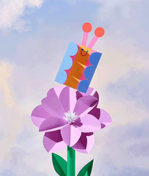 Butterfly birthday card displayed with pink flower and turquoise envelope, set against a pastel cloud background.