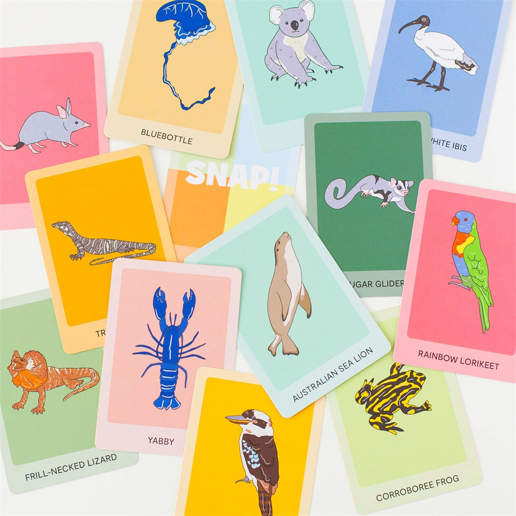 Buzz, Hiss, SNAP! card game by Megan McKean featuring 13 native Australian insects and reptiles, including the golden-tailed gecko, blue-tongue lizard, and tiger snake. Designed for little hands with vibrant, durable cards. Fun for kids with an educational twist!