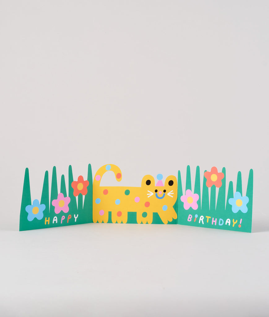 Fully unfolded cat birthday card showing both the front and reverse sides with bright floral and nature details in Susie Hammer’s signature style.