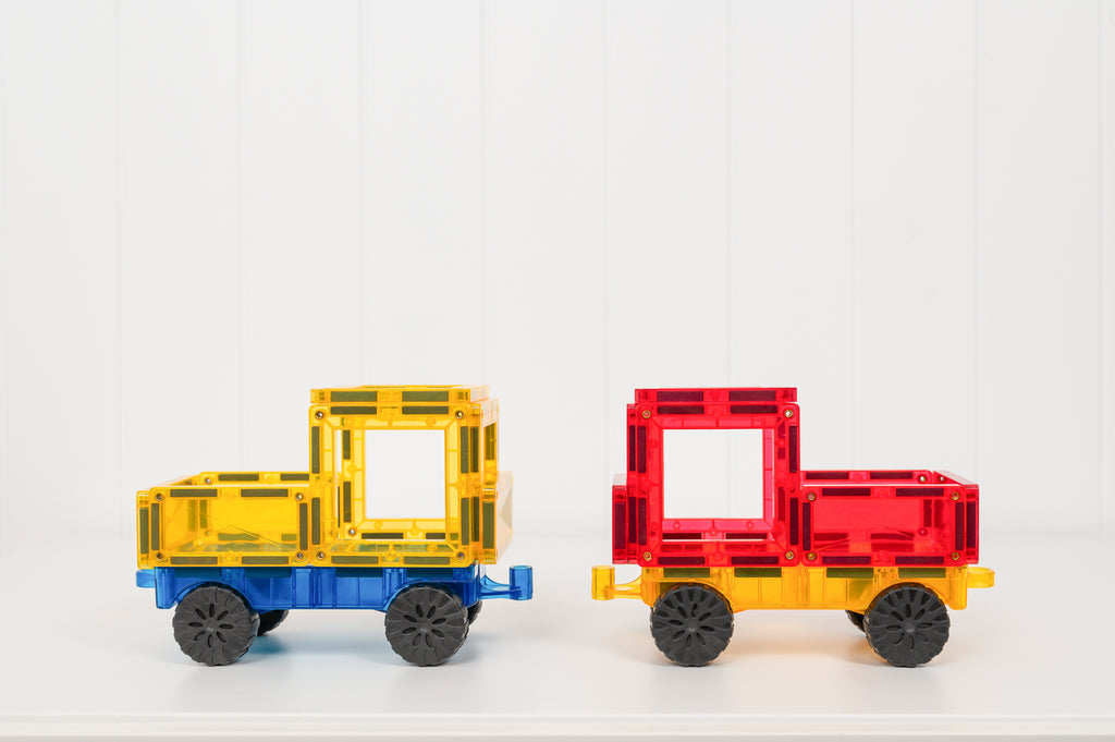 Two completed magnetic vehicles using Connetix bases—one yellow and one red—displayed on a white background.