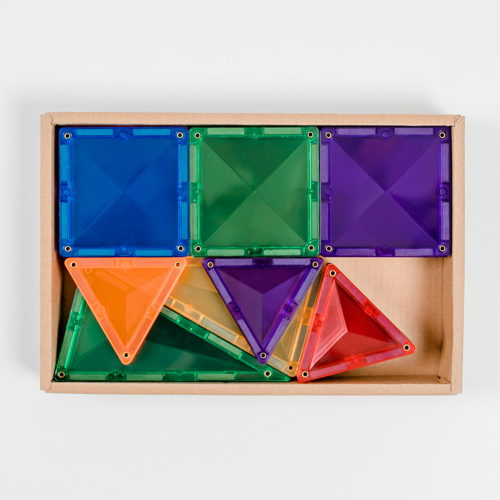 Boxed display of Connetix Rainbow Mini Pack tiles neatly arranged by colour and shape inside a wooden tray.