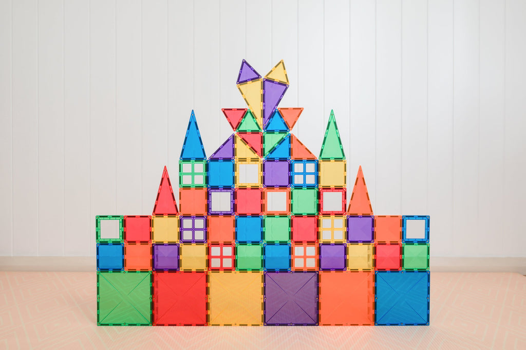 Castle-like structure built using various tile shapes and colours, showing the Starter Pack's 2D and 3D design potential.