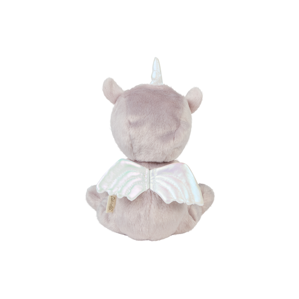 Back view of Uma Unicorn doll – Plush lilac onesie with white shimmery wings and silver unicorn horn.