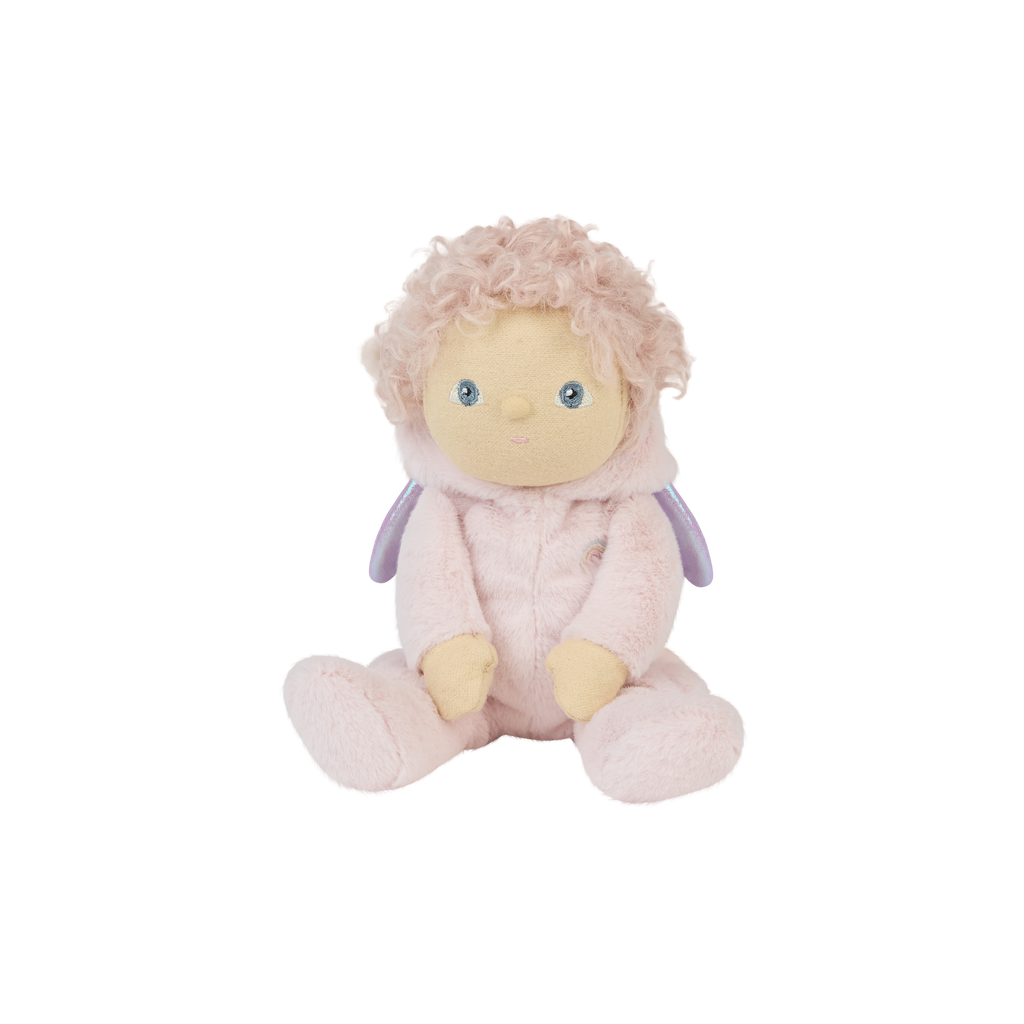 Sitting Dinky Dinkum Doll Una Unicorn without hood up – showing curly pink hair, pastel unicorn outfit, and friendly embroidered face.