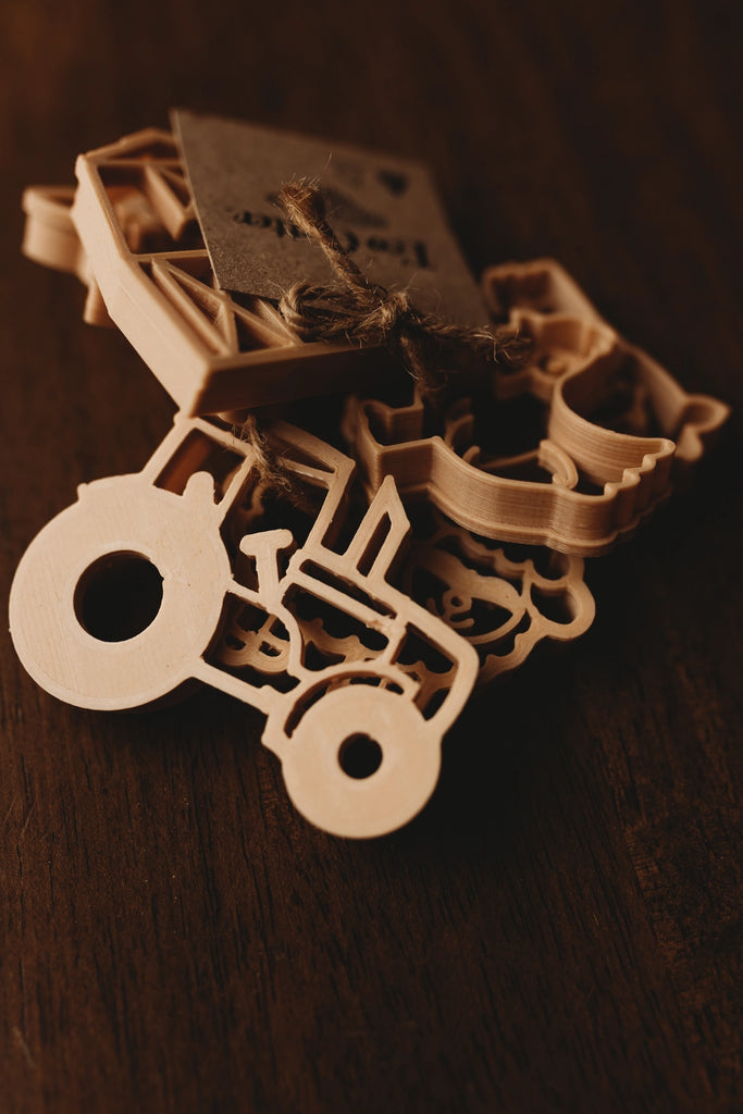 Kinfolk Pantry biodegradable farm-themed cutters styled with farm animals and accessories. Bundled with retail tag.