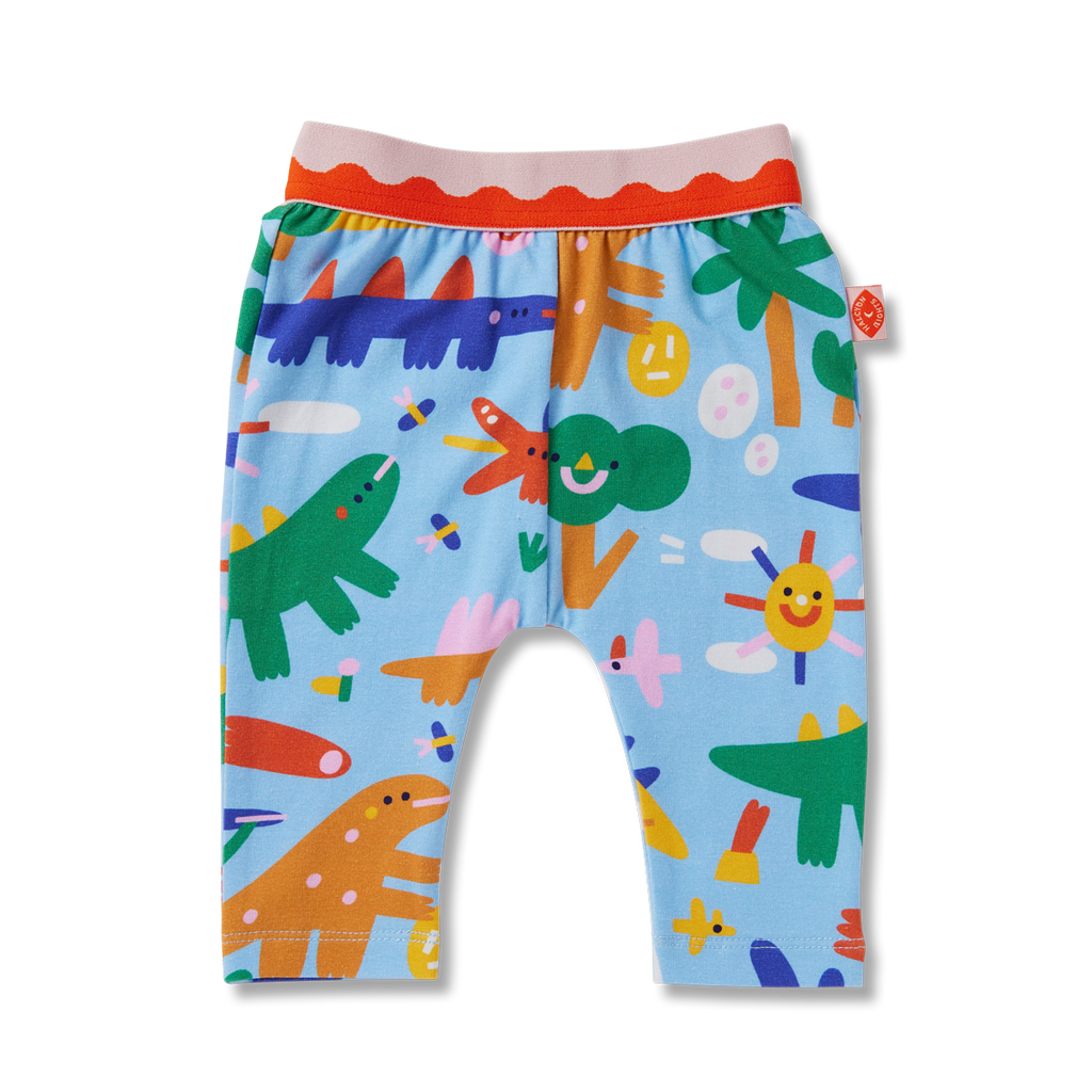 Flat lay of Halcyon Nights Dino Days baby leggings with colourful dinosaur and jungle print, footless design, and soft elastic waistband.