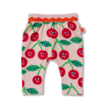 Flat lay of Halcyon Nights Cheeky Cherry baby leggings with red cherry and green leaf print, footless design, and elastic waistband for comfort.