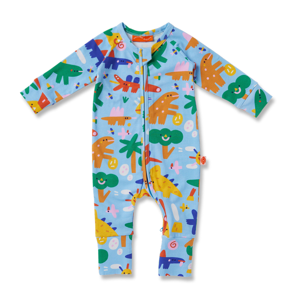 Flat lay of Halcyon Nights Dino Days long sleeve baby romper with colourful dinosaur print, fold-over cuffs, and two-way zip for easy changing.
