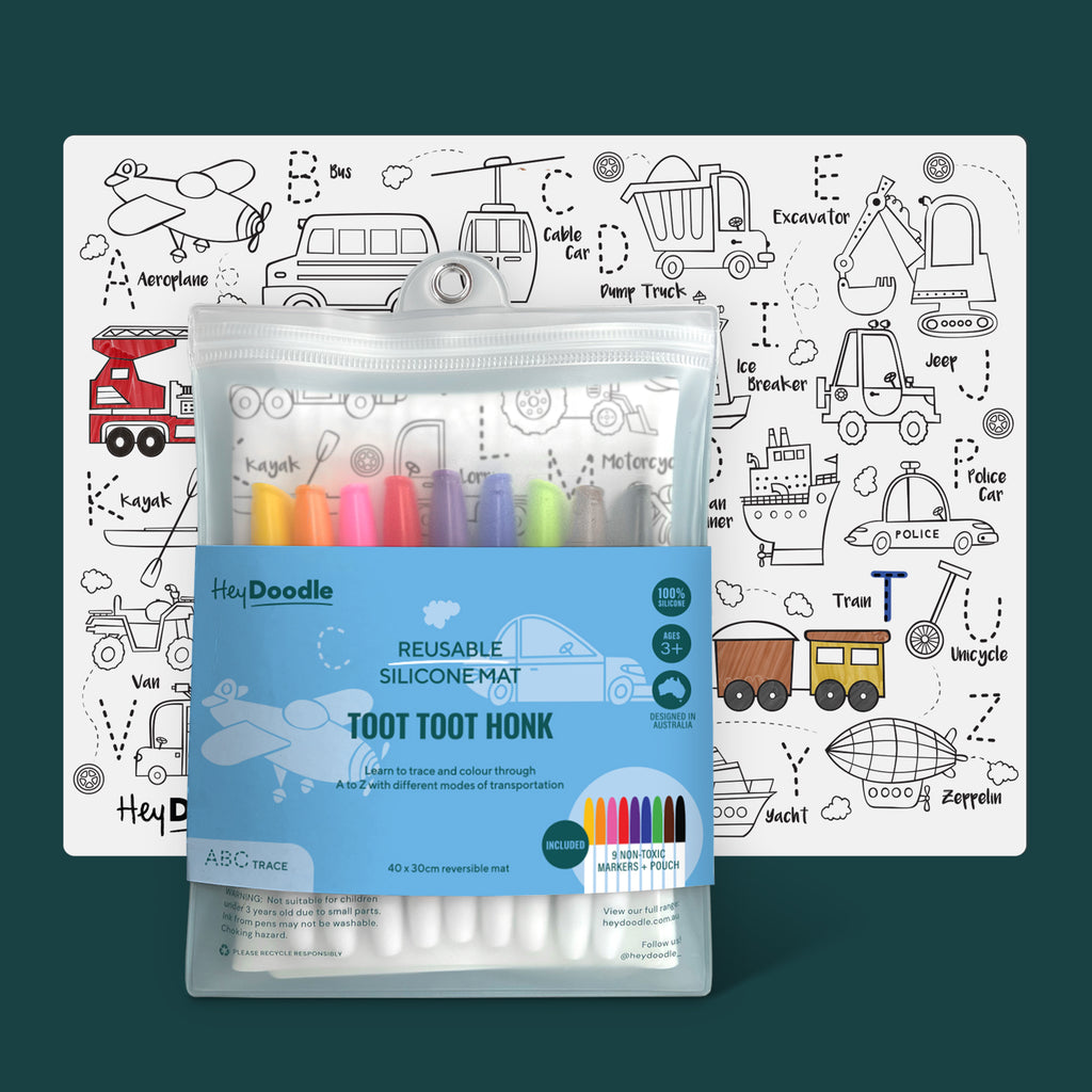HeyDoodle Classic Colouring Mat – Toot Toot Honk shown in packaging with reversible silicone mat and 9 colourful markers.