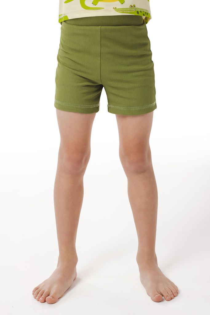 Unisex boy-leg swim shorts in avocado green with a ribbed texture, beige lining, and UPF 50+ protection. Stylish and practical for sunny adventures, designed in Australia.