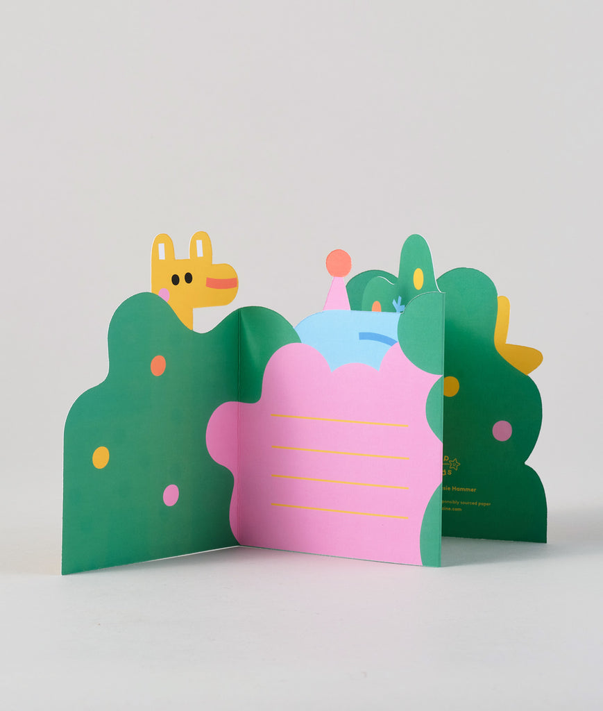 Back view of the jungle fold-out card showing the folded shapes of the animals and green jungle backdrop.