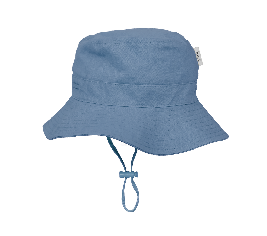 Blue Shadow Kiin Baby sun hat with a wide brim and breakaway safety clip. Made from 100% cotton with adjustable toggles for a secure fit, providing UPF 50+ excellent sun protection. Perfect for babies and toddlers.