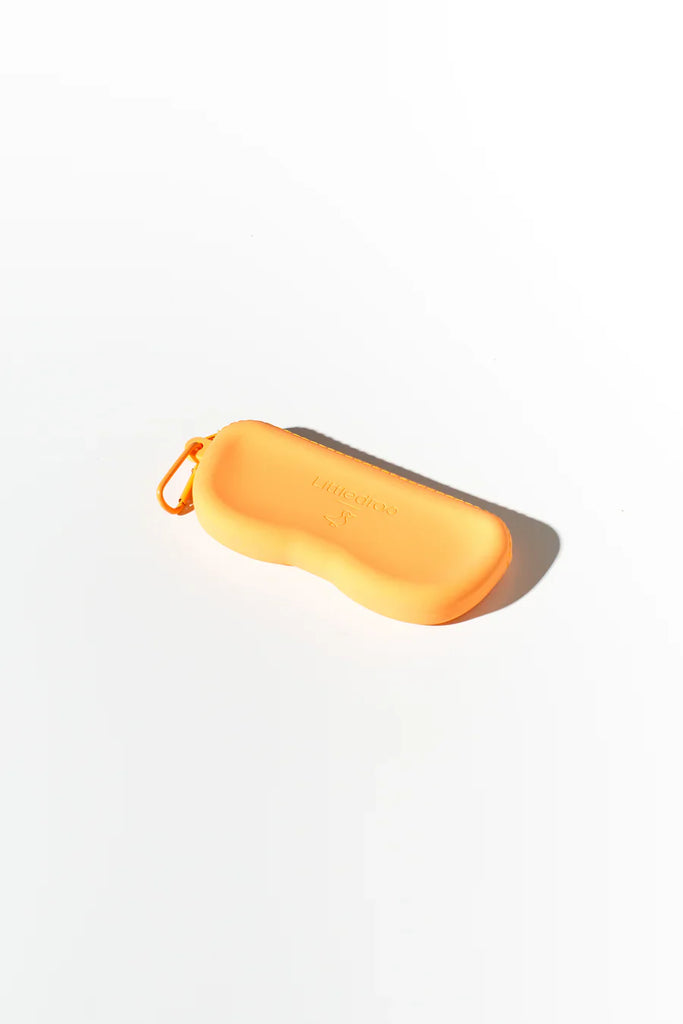 Orange silicone sunglasses case with a zipper and attached clip, shown on a white background.