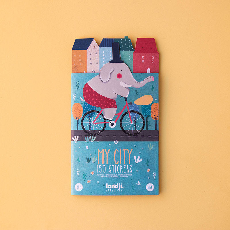 Colorful Londji My City sticker pack cover featuring an elephant on a bike with city buildings on top.