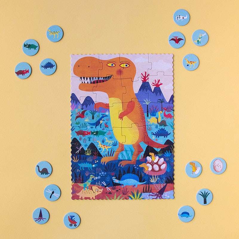 Completed Londji My Little Dino Look & Find Pocket Puzzle showing a bright orange dinosaur with other colorful prehistoric animals and plants.