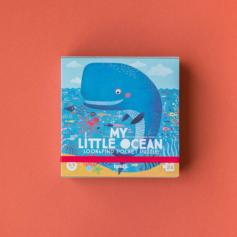 Front of Londji’s My Little Ocean Look & Find Pocket Puzzle box featuring a smiling blue whale and colorful sea creatures swimming underwater.