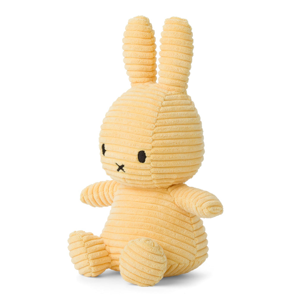 Buttercream Miffy Plush made from 100% recycled corduroy polyester. Soft, snuggly, and perfect for cuddles, measuring 23cm tall. 