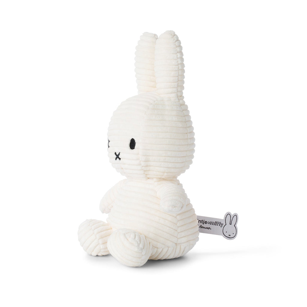 Off White Miffy Plush made from 100% recycled corduroy polyester. Soft, snuggly, and perfect for cuddles, measuring 23cm tall. 