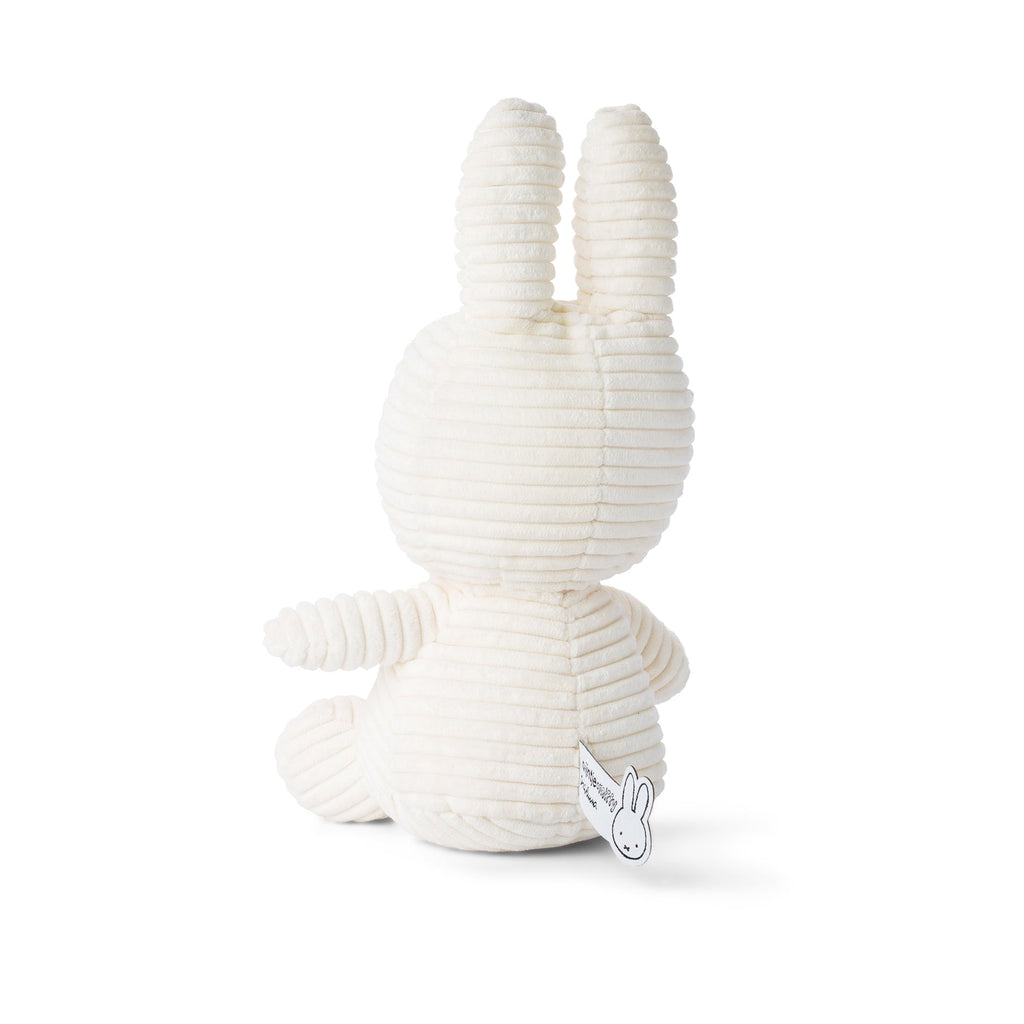Off White Miffy Plush made from 100% recycled corduroy polyester. Soft, snuggly, and perfect for cuddles, measuring 23cm tall. 