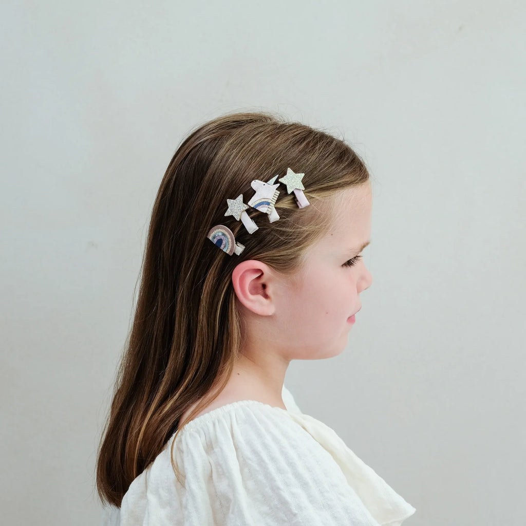 Little girl wearing Mimi & Lula Celeste Mini Clips styled along the side of her beautiful hair.