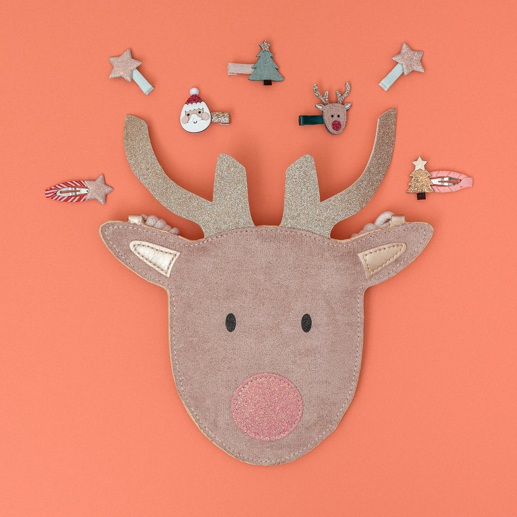 Reindeer-shaped pouch with Mimi & Lula Santa & Rudolph Clic Clacs and glittery Christmas hair clips.