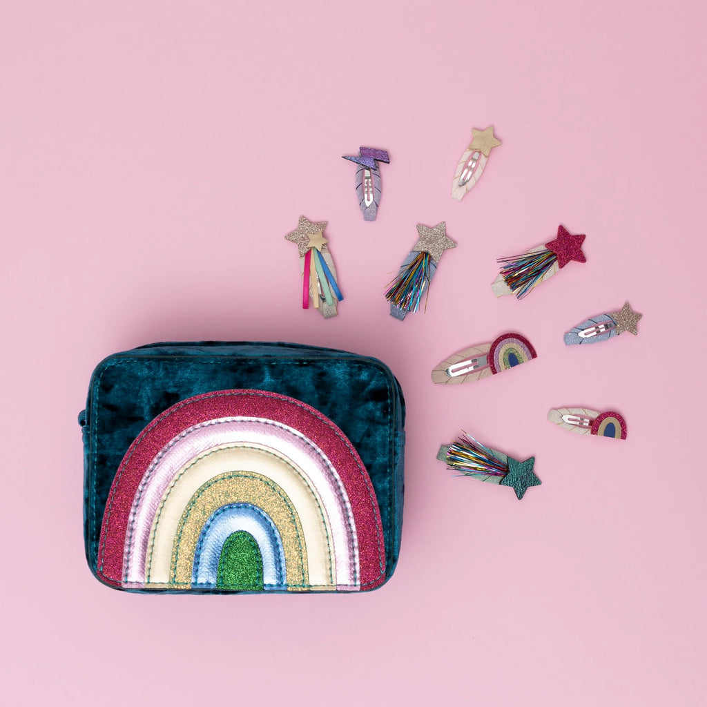 Mimi & Lula Tinsel Star Clic Clacs shown with rainbow tinsel and glitter stars in fun pastel colors.