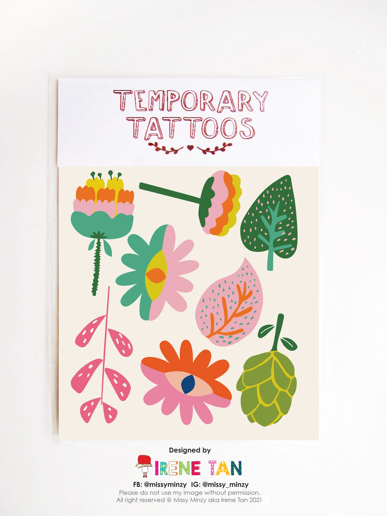 Sheet of colourful hand-drawn temporary tattoos featuring whimsical floral and leafy designs, including bold stylised blooms and an eye-shaped flower—designed by Missy Minzy.