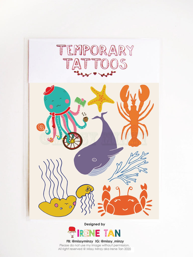 Sheet of colourful temporary tattoos featuring hand-drawn sea creatures, including a teal octopus holding coffee and cash, a purple whale, orange lobster, red crab, yellow jellyfish, coral, starfish, and more, designed by Missy Minzy.