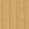 Detail of quilted honey stroller fabric – Close-up showing honey-colored quilted cotton seat material.