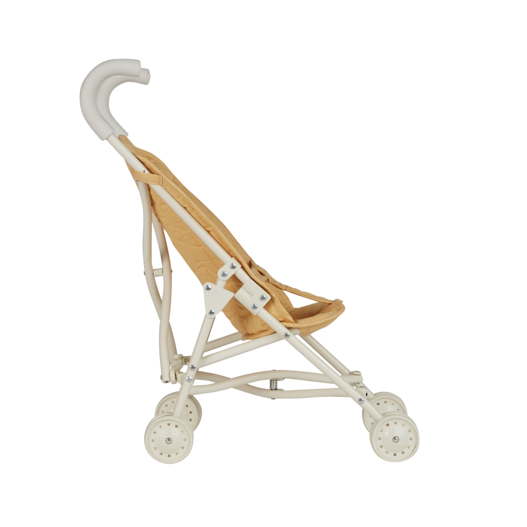 Side profile of Olli Ella Sollie Stroller Honey – Compact honey stroller with quilted cotton fabric seat and safety latch for secure play.