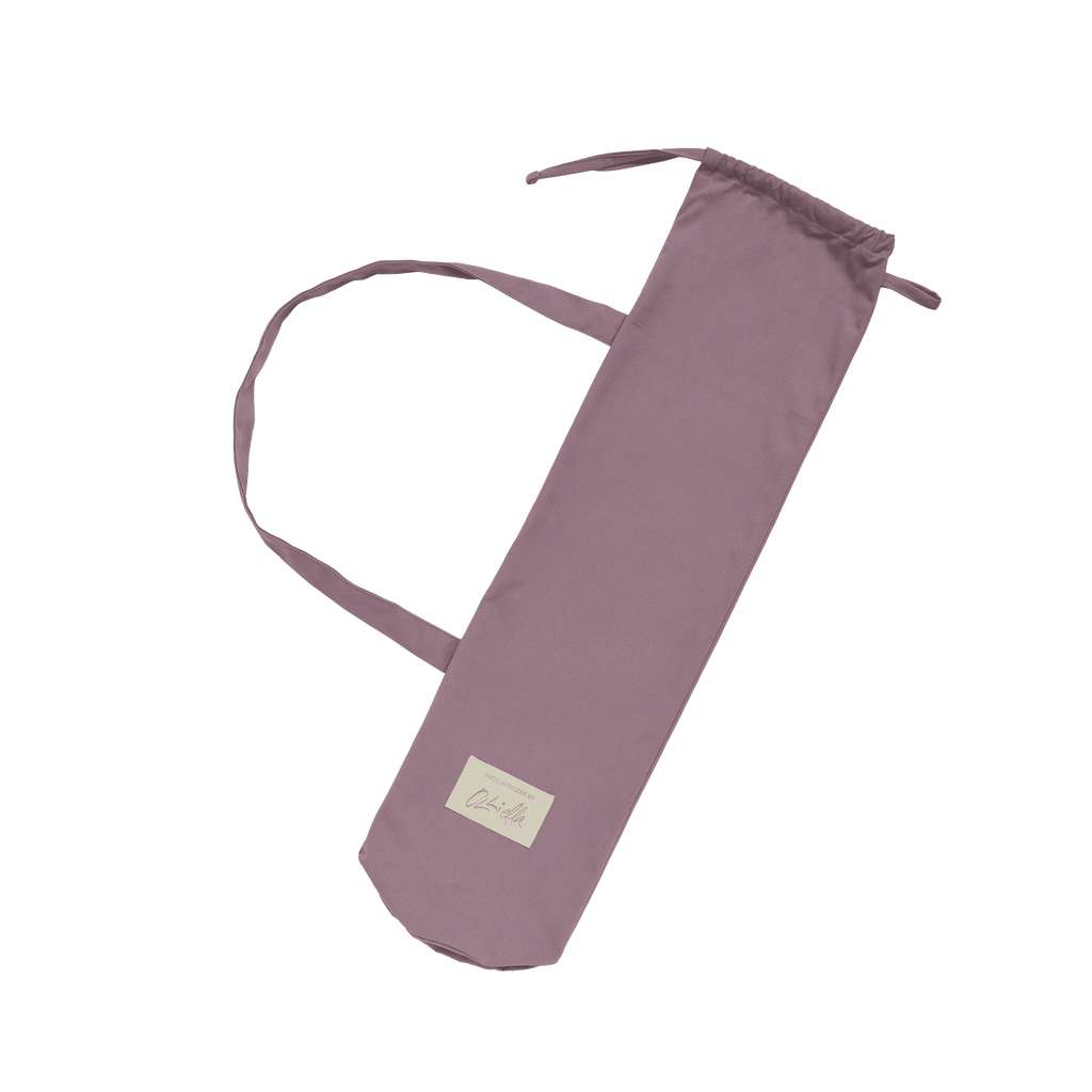 Sollie Stroller Lavender with matching carry bag – Folded stroller next to lavender cotton canvas drawstring bag with shoulder strap.