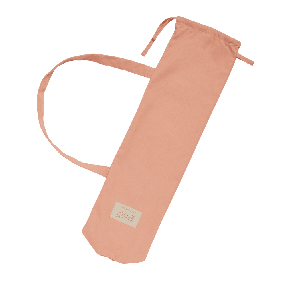 Sollie Stroller Rose with matching carry bag – Stroller folded alongside coordinating rose cotton canvas drawstring bag.